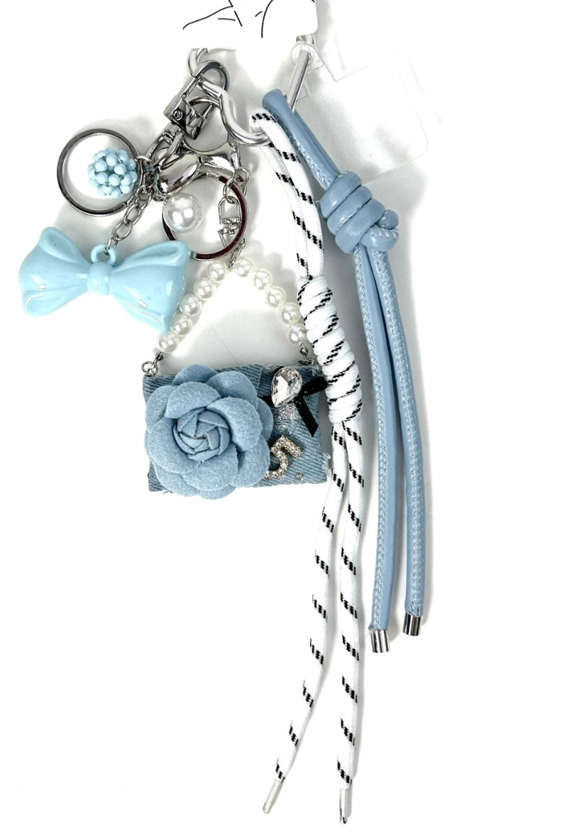 LAÇO - PORTE CLÉ SAC GRIGRI ULTRA MIGNON MINI SAC ET NŒUD BLEU